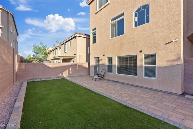 6056 Atlantis Dream Ave, Las Vegas, NV 89139 - fenced backyard featuring a patio area and a residential view