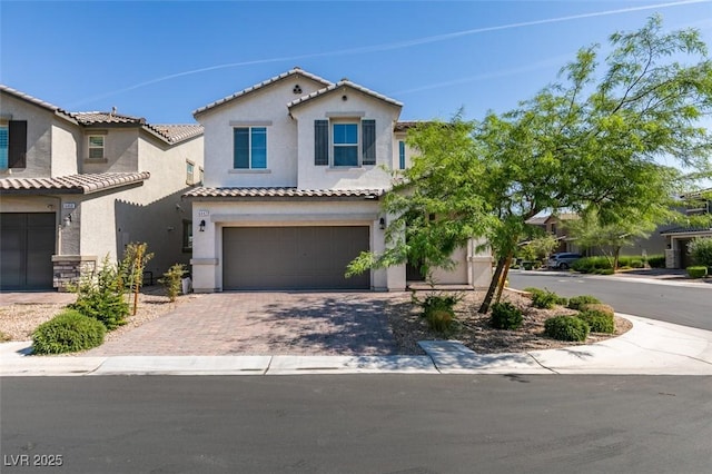 6442 Kobe Knoll Ct, Las Vegas, NV 89141 - mediterranean / spanish-style house with a garage, stucco siding, driveway, and a tile roof