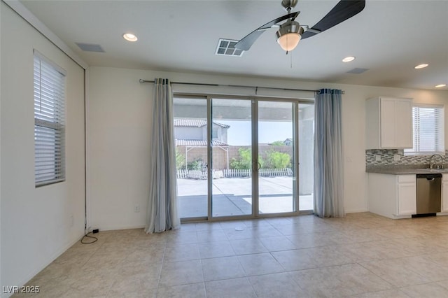 6442 Kobe Knoll Ct, Las Vegas, NV 89141 - unfurnished dining area with a ceiling fan, light tile patterned floors, and recessed lighting