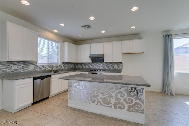 6442 Kobe Knoll Ct, Las Vegas, NV 89141 - kitchen featuring dishwasher, healthy amount of natural light, backsplash, under cabinet range hood, and recessed lighting
