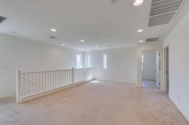 6442 Kobe Knoll Ct, Las Vegas, NV 89141 - unfurnished room featuring light carpet and recessed lighting