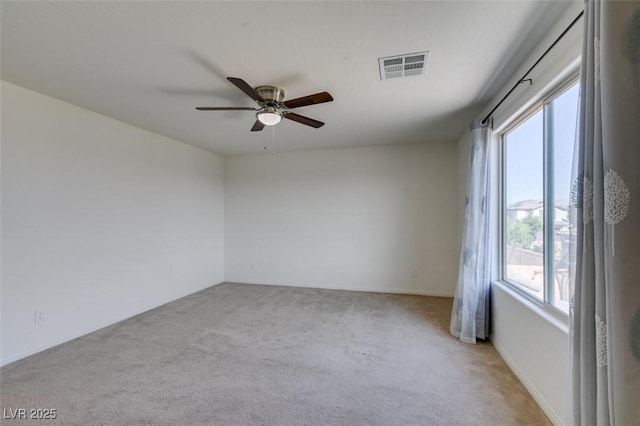 6442 Kobe Knoll Ct, Las Vegas, NV 89141 - unfurnished room featuring healthy amount of natural light, light colored carpet, and ceiling fan