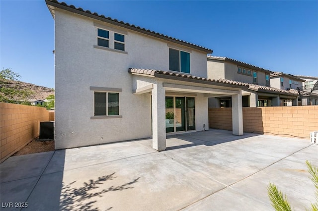 6442 Kobe Knoll Ct, Las Vegas, NV 89141 - back of house with stucco siding, a patio area, and a tile roof