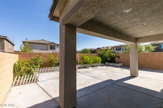 6442 Kobe Knoll Ct, Las Vegas, NV 89141 - fenced backyard featuring a patio and a residential view