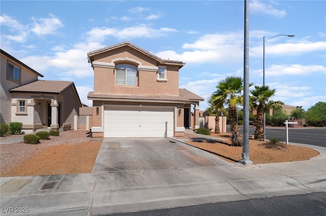 7288 Quarterhorse Ln, Las Vegas, NV 89148 - view of front of house with a garage, concrete driveway, and stucco siding