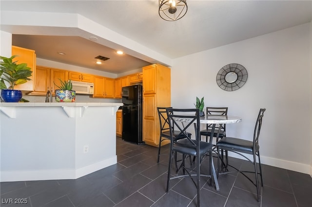 7288 Quarterhorse Ln, Las Vegas, NV 89148 - dining area featuring recessed lighting and dark tile patterned flooring