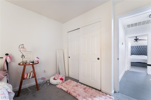 7288 Quarterhorse Ln, Las Vegas, NV 89148 - carpeted bedroom featuring a closet and baseboards