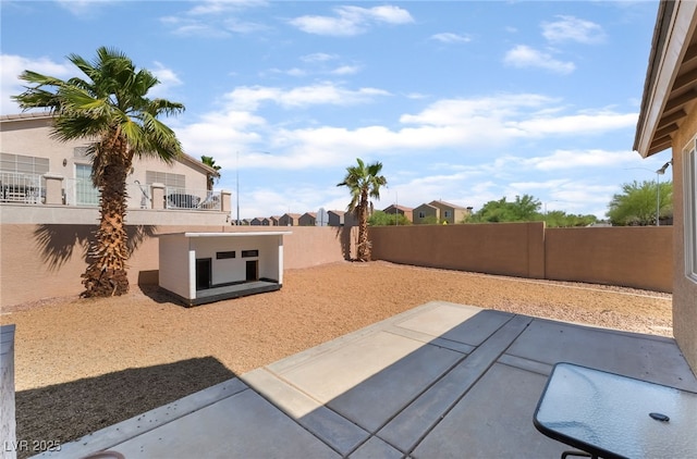 7288 Quarterhorse Ln, Las Vegas, NV 89148 - fenced backyard featuring a patio