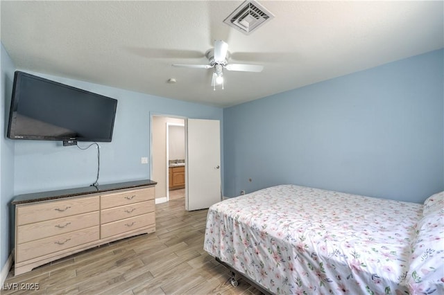 4428 Los Reyes Ct, Las Vegas, NV 89121 - bedroom with light wood-type flooring and a ceiling fan