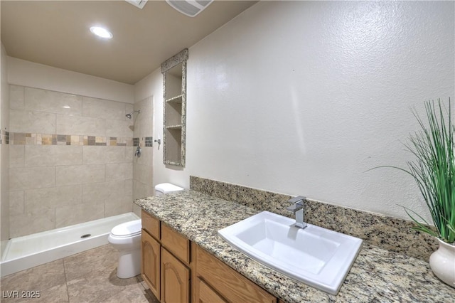 4428 Los Reyes Ct, Las Vegas, NV 89121 - full bath featuring toilet, tiled shower, and vanity