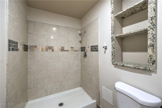 4428 Los Reyes Ct, Las Vegas, NV 89121 - full bathroom featuring tiled shower and toilet