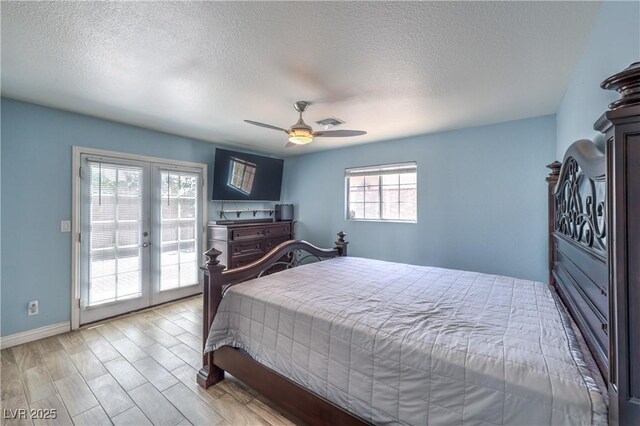 4428 Los Reyes Ct, Las Vegas, NV 89121 - bedroom featuring access to outside, a textured ceiling, baseboards, french doors, and wood finished floors