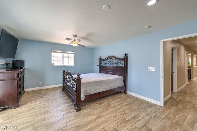 4428 Los Reyes Ct, Las Vegas, NV 89121 - bedroom featuring light wood-type flooring, baseboards, ceiling fan, recessed lighting, and a textured ceiling