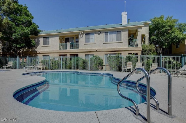 5155 W Tropicana Ave Unit 2095, Las Vegas, NV 89103 - community pool with a patio area