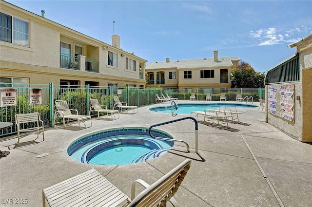5155 W Tropicana Ave Unit 2095, Las Vegas, NV 89103 - community pool featuring a hot tub and a patio