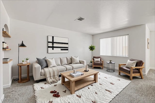 1846 N Decatur Blvd Unit 104, Las Vegas, NV 89108 - living room with carpet and baseboards