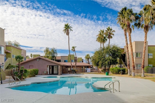 1846 N Decatur Blvd Unit 104, Las Vegas, NV 89108 - community pool featuring a jacuzzi and a patio