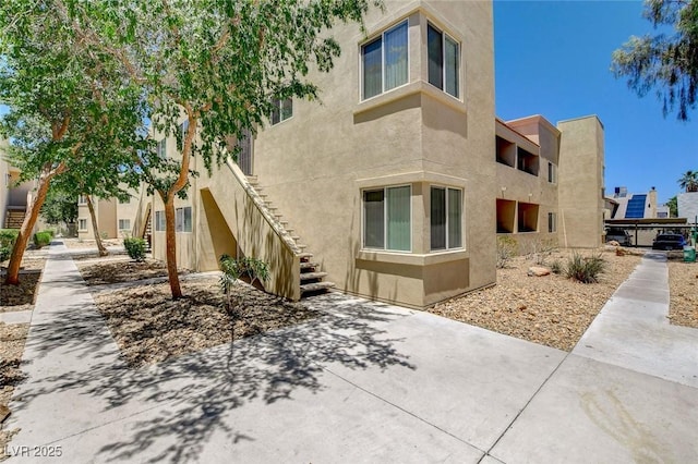 1846 N Decatur Blvd Unit 104, Las Vegas, NV 89108 - view of building exterior with stairs
