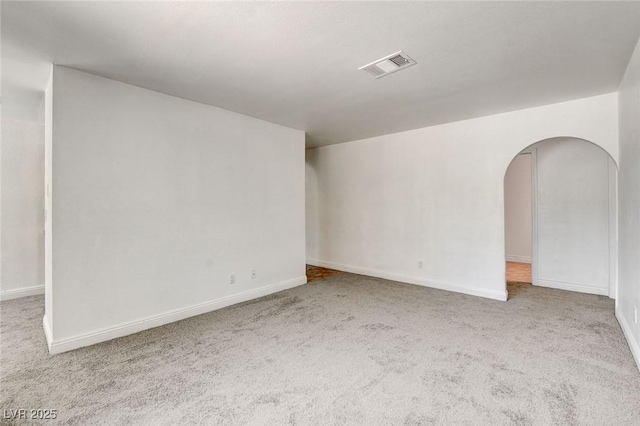 1846 N Decatur Blvd Unit 104, Las Vegas, NV 89108 - spare room with carpet and arched walkways