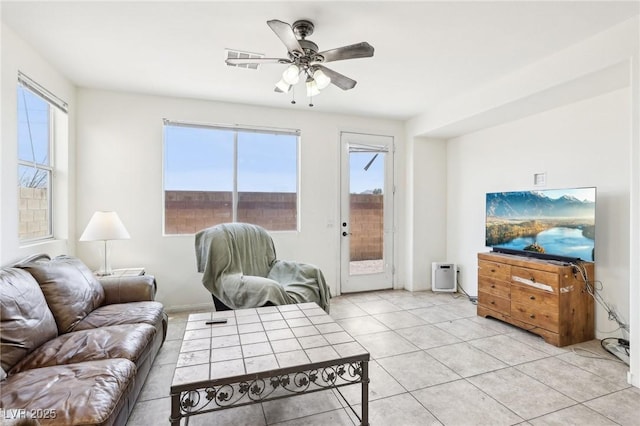 8341 Lower Trailhead Ave, Las Vegas, NV 89113 - living area featuring plenty of natural light, ceiling fan, and light tile patterned flooring