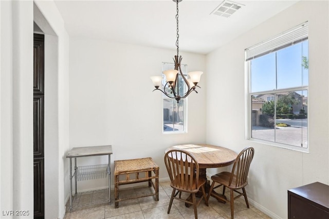 8341 Lower Trailhead Ave, Las Vegas, NV 89113 - dining room featuring baseboards, a chandelier, and tile patterned floors