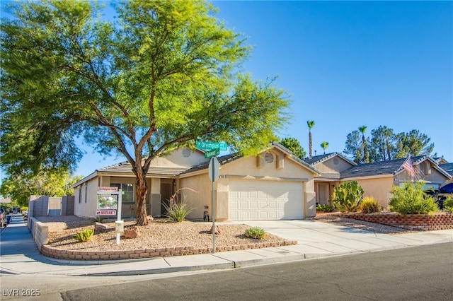 7801 Olympus Ave, Las Vegas, NV 89131 - ranch-style house with a garage, concrete driveway, and stucco siding