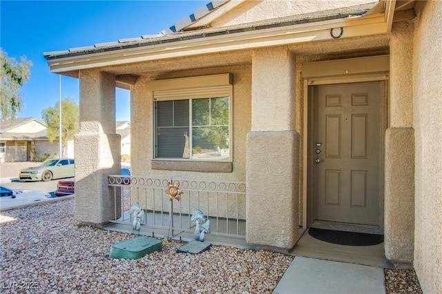 7801 Olympus Ave, Las Vegas, NV 89131 - view of exterior entry featuring stucco siding