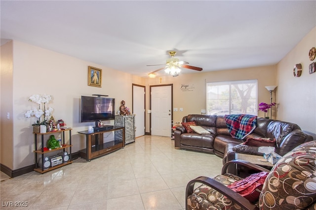 7801 Olympus Ave, Las Vegas, NV 89131 - living area with a ceiling fan and light tile patterned floors
