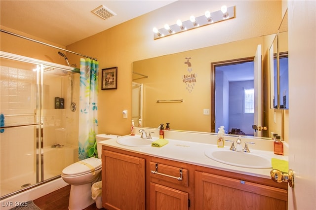 7801 Olympus Ave, Las Vegas, NV 89131 - bathroom featuring a shower stall and double vanity