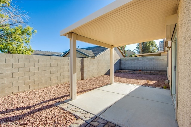 7801 Olympus Ave, Las Vegas, NV 89131 - fenced backyard featuring a patio