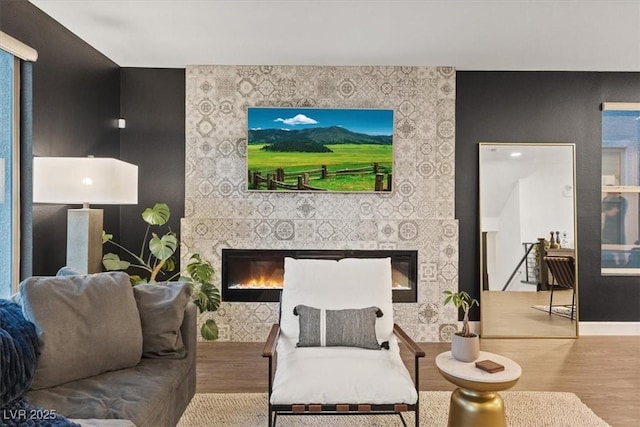 8055 Haywood Estate Ave, Las Vegas, NV 89113 - living area with a fireplace and wood finished floors