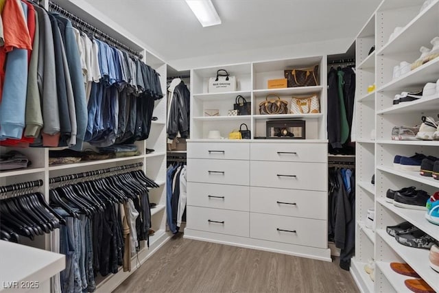 8055 Haywood Estate Ave, Las Vegas, NV 89113 - spacious closet featuring wood finished floors