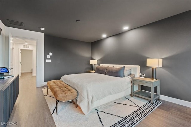 8055 Haywood Estate Ave, Las Vegas, NV 89113 - bedroom featuring light wood-style floors and recessed lighting