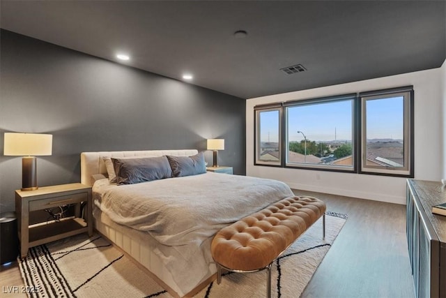 8055 Haywood Estate Ave, Las Vegas, NV 89113 - bedroom with wood finished floors and recessed lighting