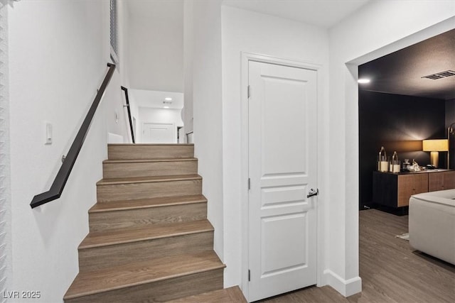 8055 Haywood Estate Ave, Las Vegas, NV 89113 - stairway featuring wood finished floors and baseboards
