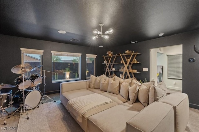 8055 Haywood Estate Ave, Las Vegas, NV 89113 - bedroom featuring a chandelier, wood finished floors, and a textured ceiling