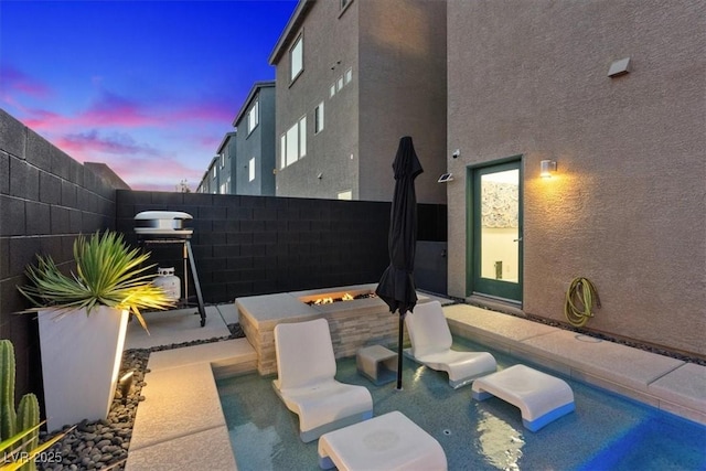 8055 Haywood Estate Ave, Las Vegas, NV 89113 - view of patio with a fire pit and a grill