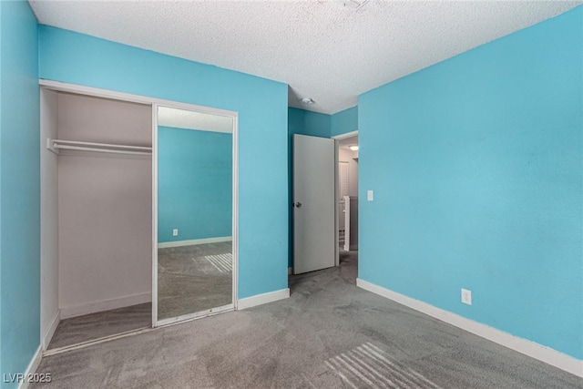 1704 Kismet Cir, Las Vegas, NV 89108 - unfurnished bedroom with a closet, carpet floors, a textured ceiling, and baseboards
