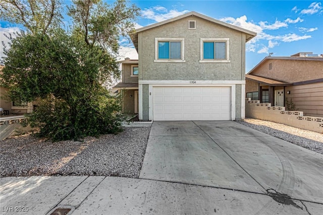 1704 Kismet Cir, Las Vegas, NV 89108 - view of front of property with a garage, concrete driveway, and stucco siding