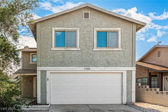 1704 Kismet Cir, Las Vegas, NV 89108 - view of front of property featuring stucco siding, an attached garage, and concrete driveway