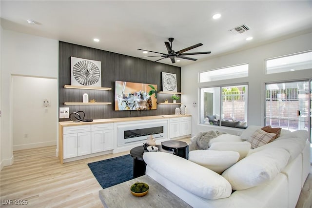 9813 Folsom Dr, Las Vegas, NV 89134 - living area with light wood-style floors, recessed lighting, ceiling fan, and baseboards