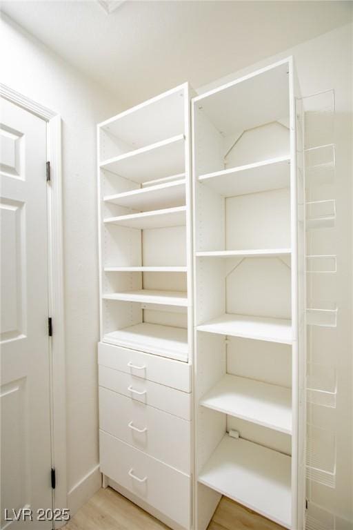 9813 Folsom Dr, Las Vegas, NV 89134 - spacious closet featuring light wood-type flooring