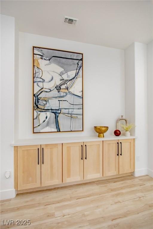 10709 Hunters Woods Pl, Las Vegas, NV 89134 - detailed view of baseboards and wood finished floors