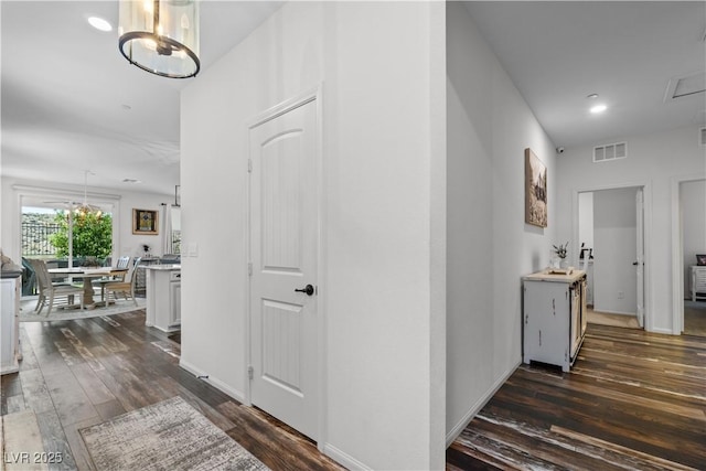 2207 Valdina St, Henderson, NV 89044 - hall with dark wood-style flooring, a chandelier, and recessed lighting