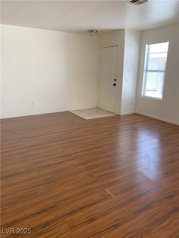 6470 Shining Sand Ave, Las Vegas, NV 89142 - spare room with wood finished floors and baseboards