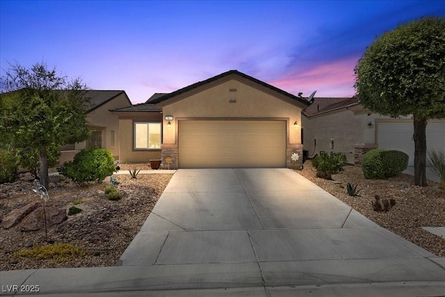 7817 Homing Pigeon St, North Las Vegas, NV 89084 - ranch-style home with an attached garage, driveway, and stucco siding