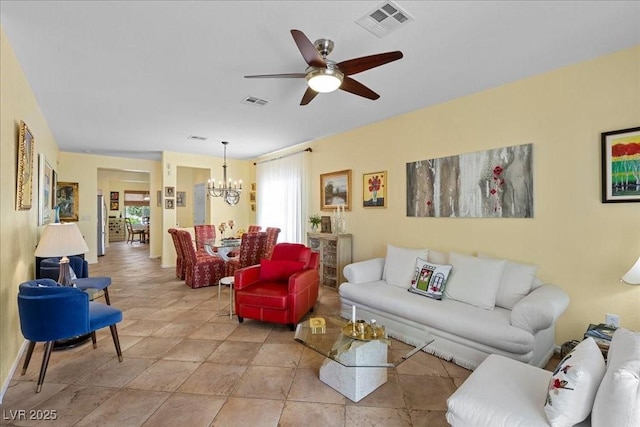 7817 Homing Pigeon St, North Las Vegas, NV 89084 - living room featuring a chandelier, plenty of natural light, and ceiling fan