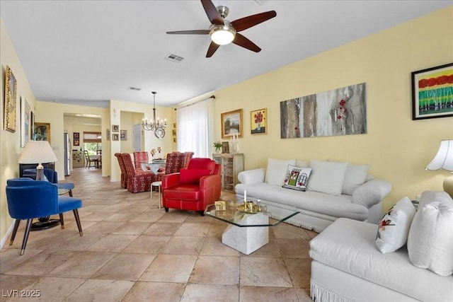 7817 Homing Pigeon St, North Las Vegas, NV 89084 - living area featuring a chandelier and a ceiling fan
