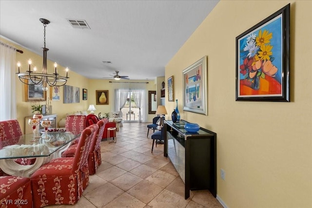 7817 Homing Pigeon St, North Las Vegas, NV 89084 - dining space with a chandelier and a ceiling fan