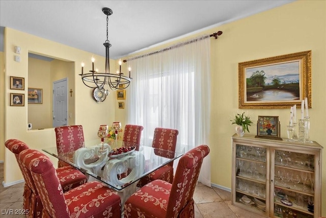 7817 Homing Pigeon St, North Las Vegas, NV 89084 - dining room with a chandelier and tile patterned floors